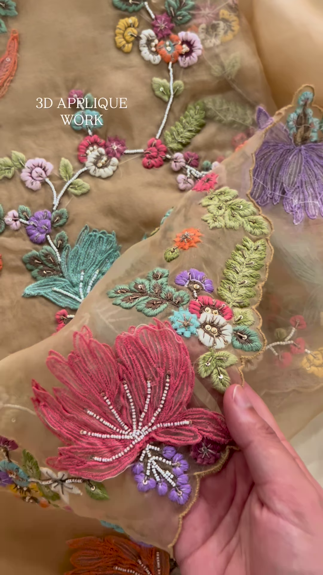 Luxurious Rose-Pink Fabric with Opulent Floral Embroidery